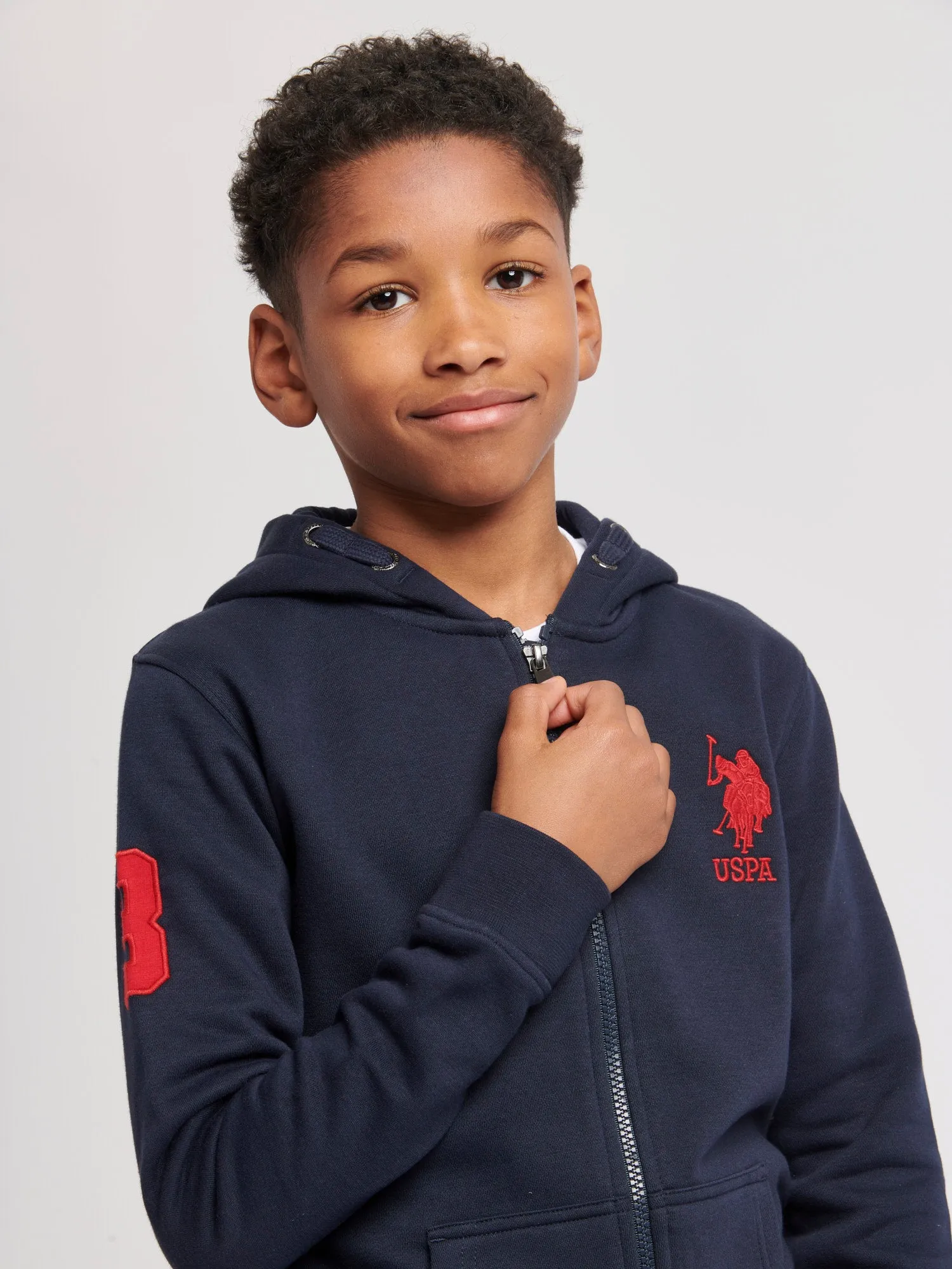 Boys Player 3 Zip Hoodie in Dark Sapphire Navy / Haute Red DHM