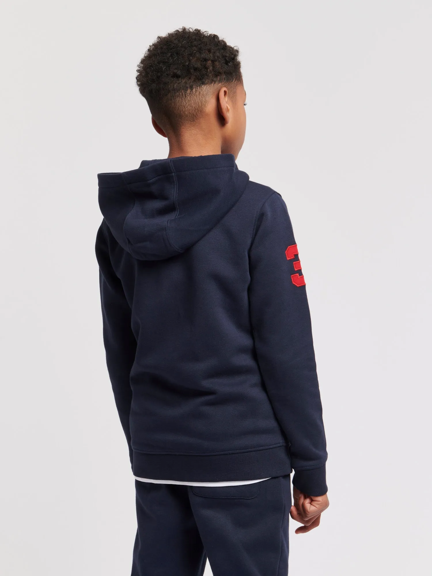 Boys Player 3 Zip Hoodie in Dark Sapphire Navy / Haute Red DHM