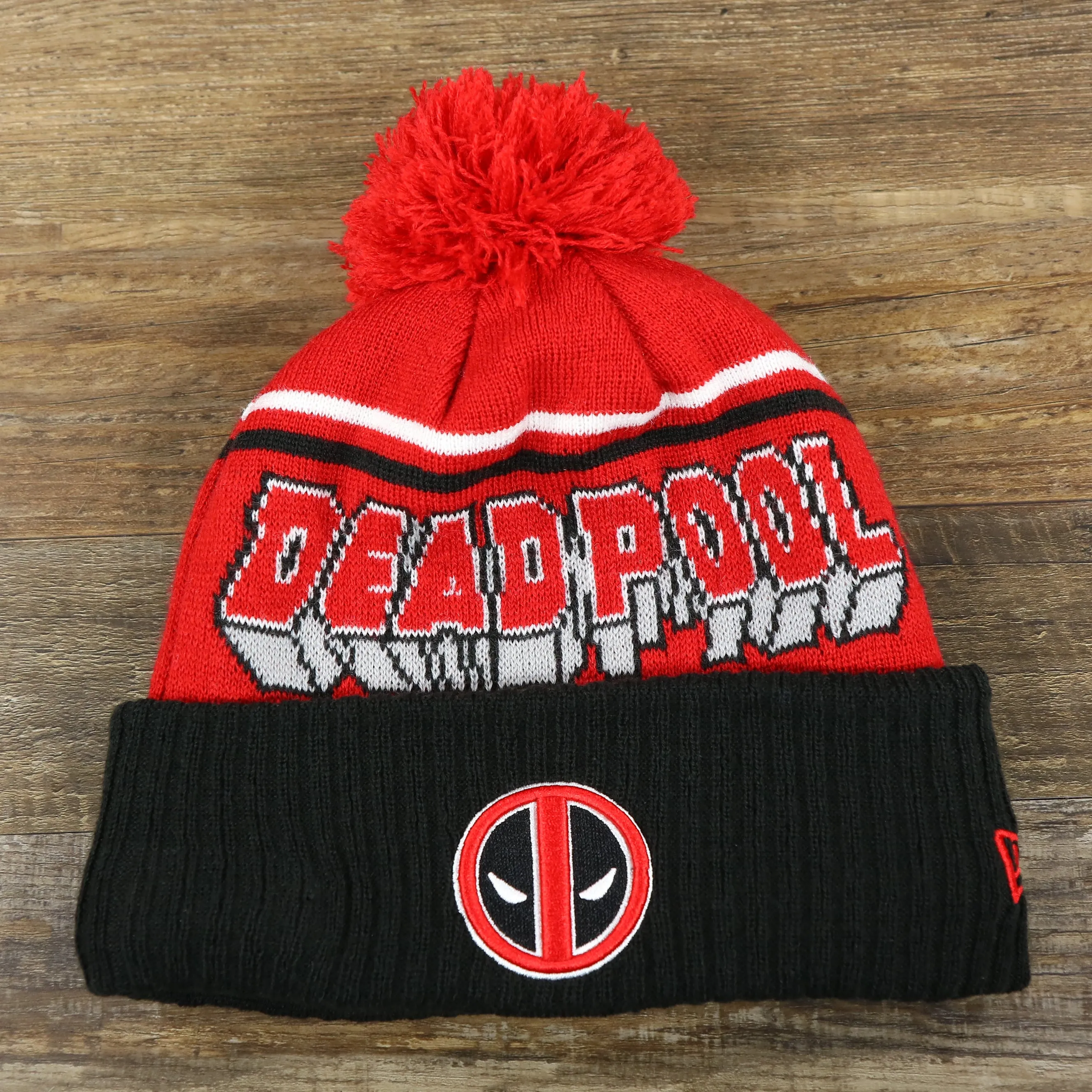 DC Comics Deadpool Mask Logo Deadpool Wordmark Striped Beanie With Red Pom Pom | Red And Black Winter Beanie