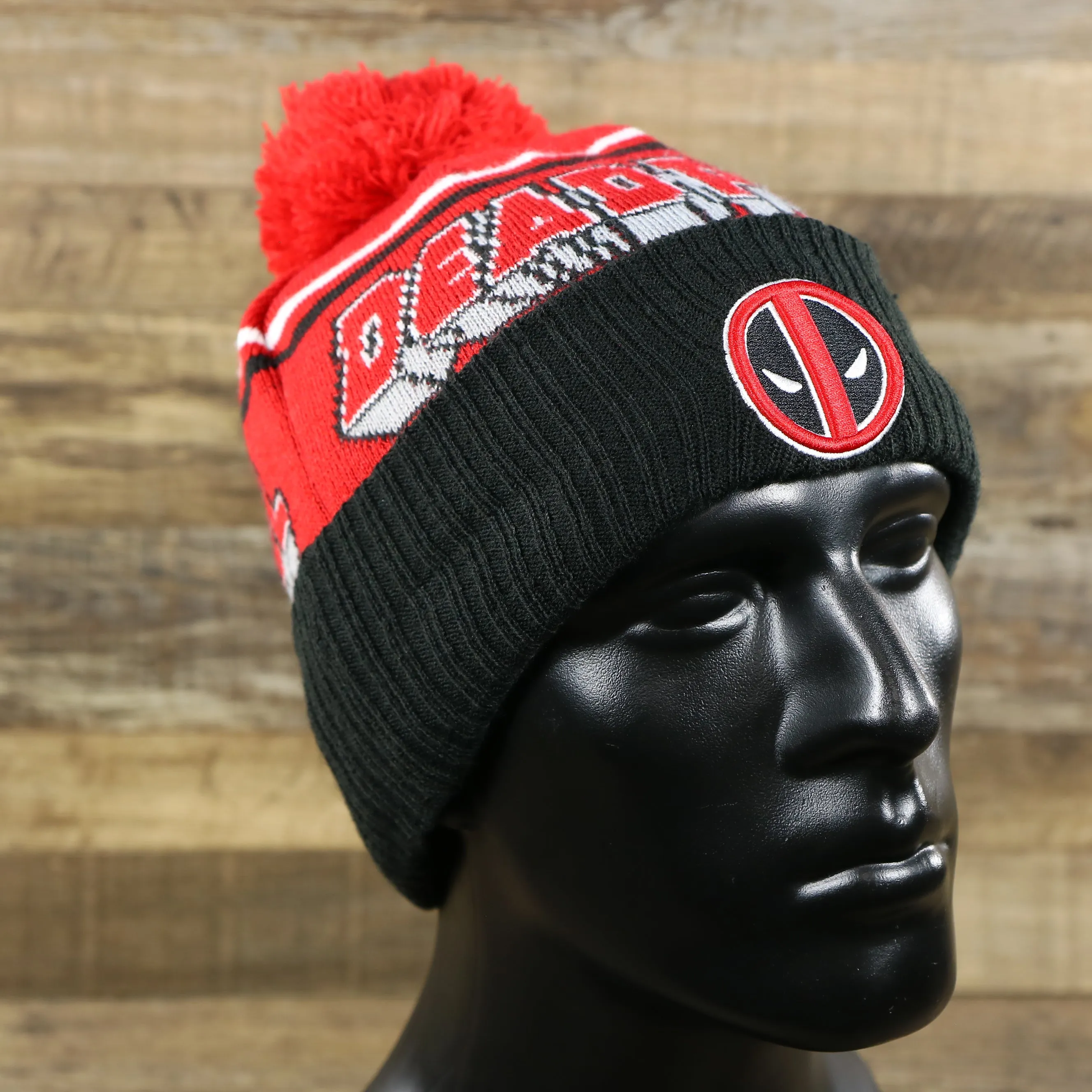 DC Comics Deadpool Mask Logo Deadpool Wordmark Striped Beanie With Red Pom Pom | Red And Black Winter Beanie