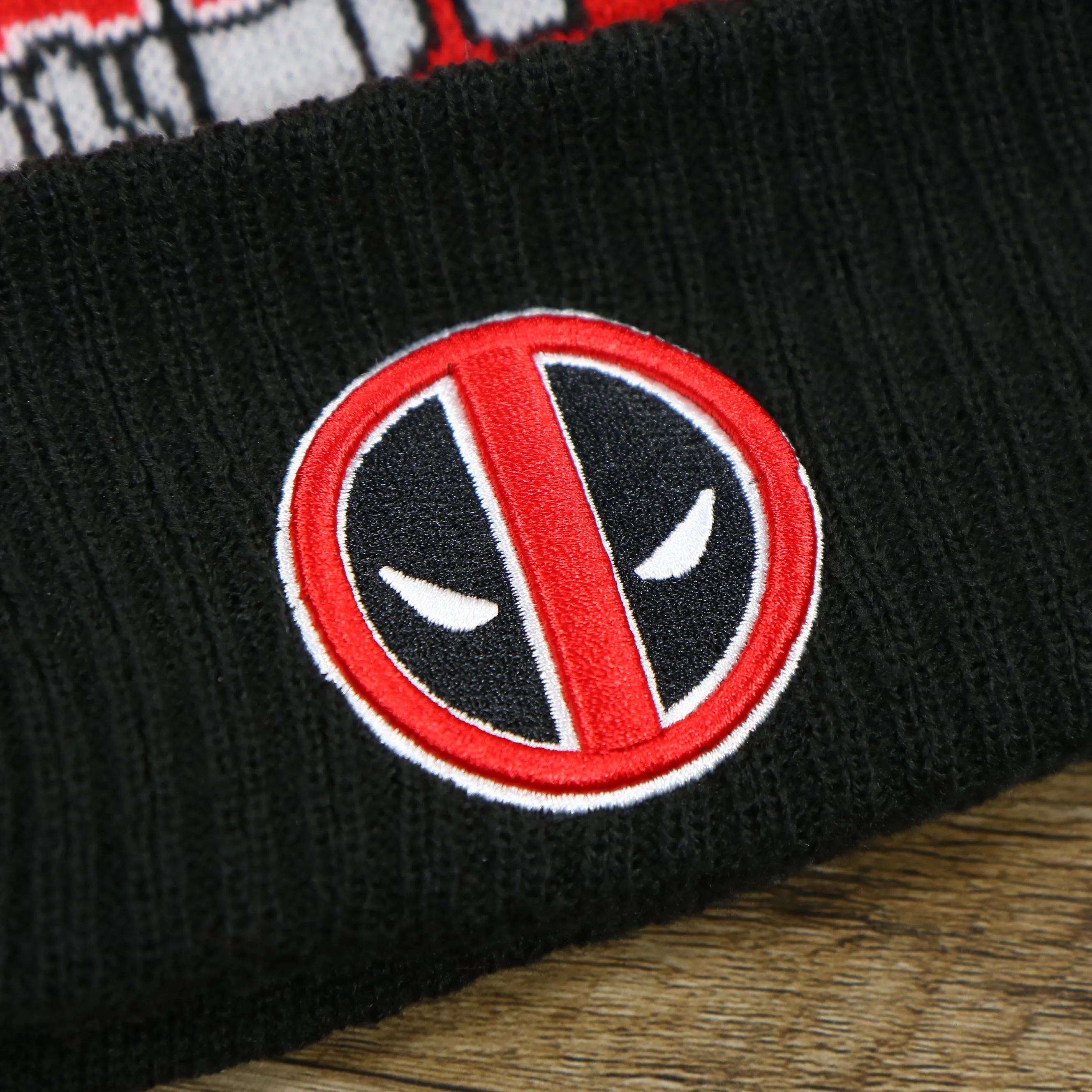 DC Comics Deadpool Mask Logo Deadpool Wordmark Striped Beanie With Red Pom Pom | Red And Black Winter Beanie