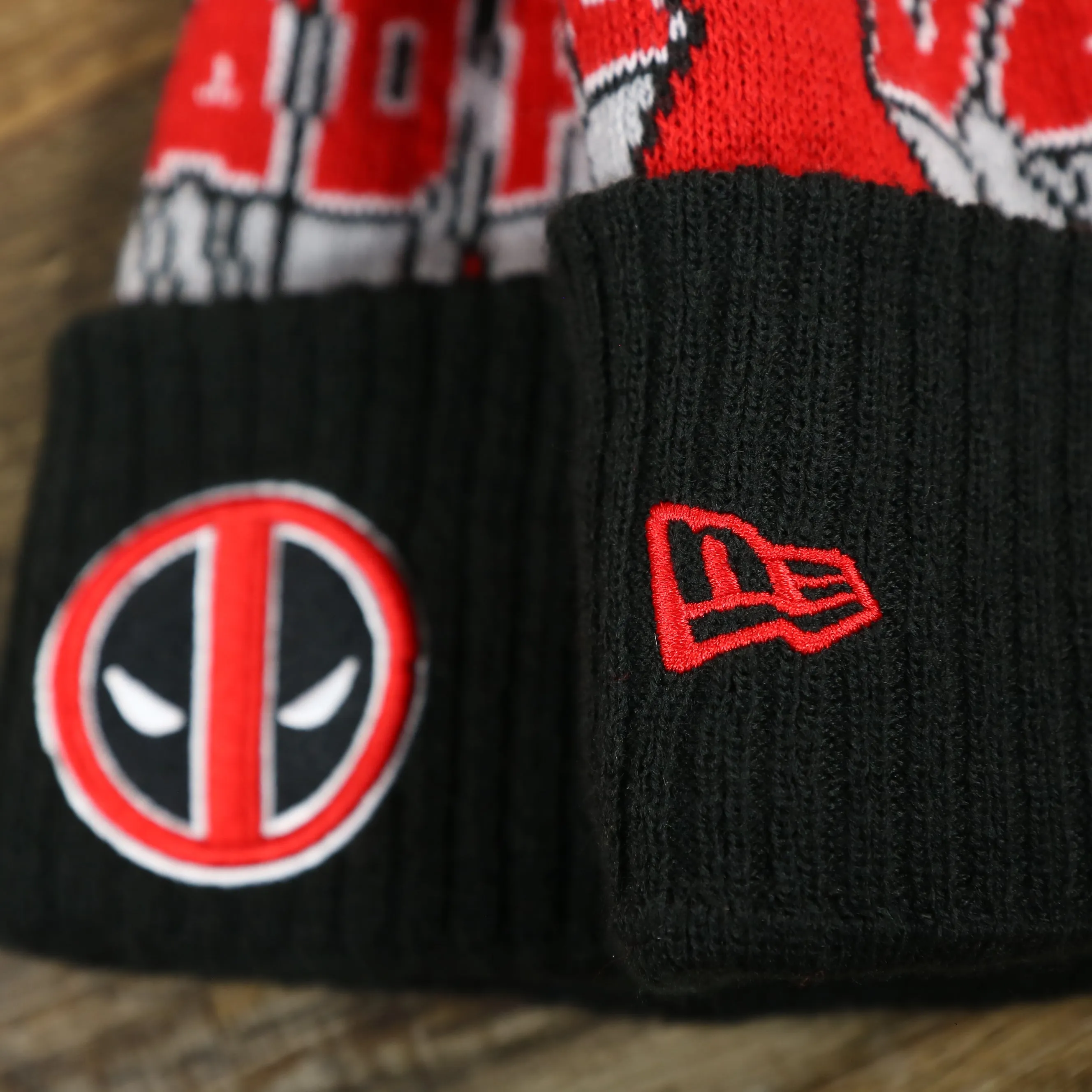 DC Comics Deadpool Mask Logo Deadpool Wordmark Striped Beanie With Red Pom Pom | Red And Black Winter Beanie