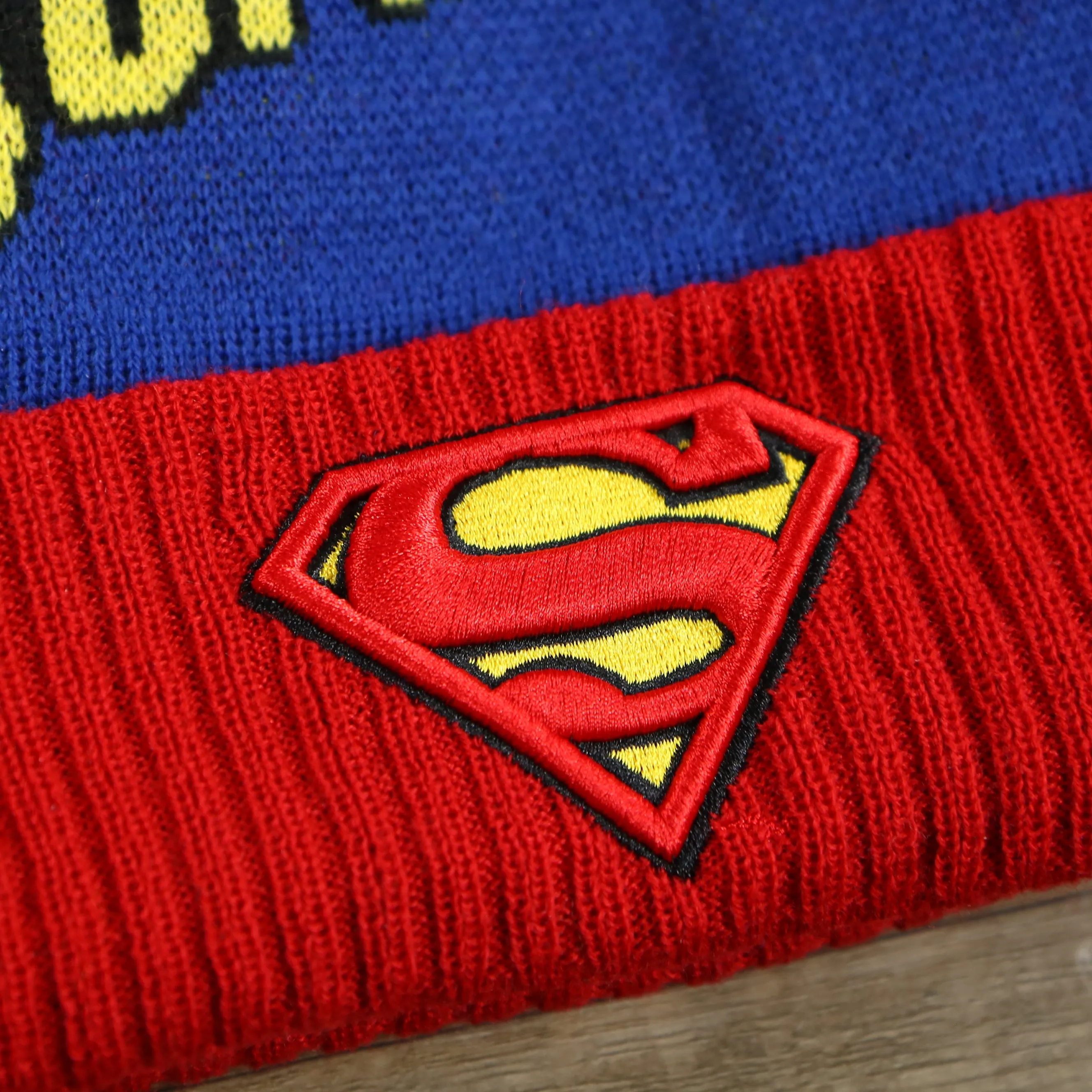 DC Comics Superman S-Shield Logo Superman Wordmark Striped Beanie With Blue Pom Pom | Blue And Red Winter Beanie