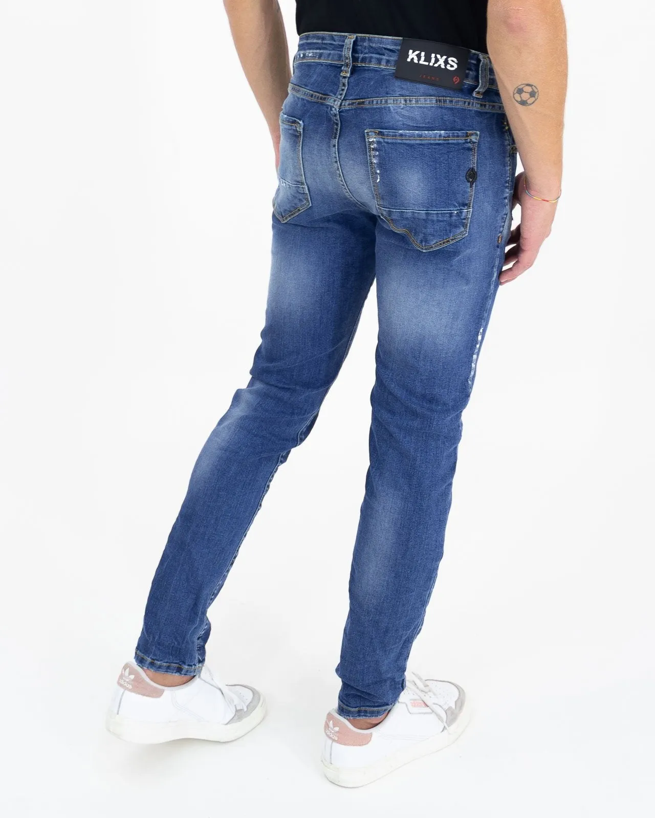 Jeans skinny effetto macchie