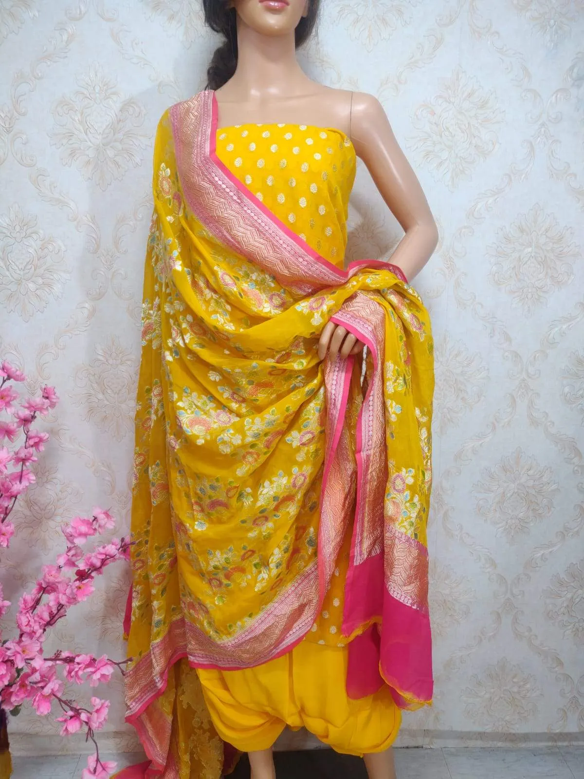 Yellow Handloom Banarasi Pure Georgette Three Piece Unstitched Suit Set With Brush Dye Dupatta