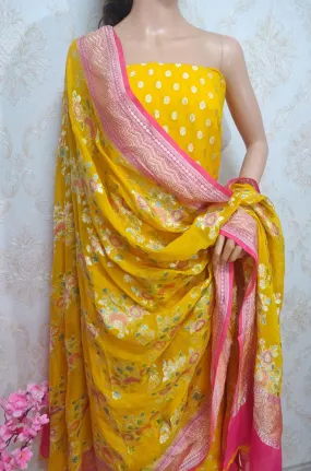 Yellow Handloom Banarasi Pure Georgette Three Piece Unstitched Suit Set With Brush Dye Dupatta